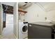 Convenient laundry area with modern washer and dryer, adding ease to household chores at 712 Beaver Dam Rd, Raleigh, NC 27607