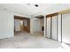 Open-concept living room showcasing access to other living spaces and a fireplace at 712 Beaver Dam Rd, Raleigh, NC 27607