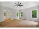 Spacious bedroom with a ceiling fan and carpet at 7309 New Forest Ln, Wake Forest, NC 27587