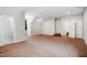 Large bedroom with carpet, neutral walls and multiple doors to other rooms at 7309 New Forest Ln, Wake Forest, NC 27587