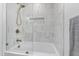 Bathroom showcases a tub, light tile, glass door, and bronze fixtures at 7816 Harbor Dr, Raleigh, NC 27615
