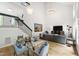 Open floorplan with hardwood floors, comfortable seating, dining area, and abundant natural light at 7816 Harbor Dr, Raleigh, NC 27615