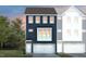 Charming townhome with a two-car garage and beautiful facade at 796 Larkspur Bowl Way, Apex, NC 27523