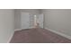 Spacious bedroom with neutral carpeting and trim at 80 Bramble Ln, Clayton, NC 27527