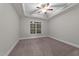 Cozy bedroom with neutral carpet, a ceiling fan, and a bright window at 80 Bramble Ln, Clayton, NC 27527