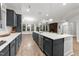Spacious kitchen featuring a large island, stainless steel appliances, and plenty of counter space at 80 Bramble Ln, Clayton, NC 27527