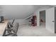 Cozy bonus room with arcade game, desk, and doorway to another bedroom at 8505 Stonegate Dr, Raleigh, NC 27615