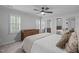 Well-lit bedroom with mirrored closet doors and built-in dressers at 8505 Stonegate Dr, Raleigh, NC 27615