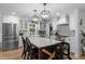 Beautiful kitchen with a large center island, modern appliances, and white cabinetry at 8505 Stonegate Dr, Raleigh, NC 27615