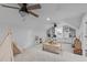 Spacious playroom with built-in shelving and space for creative activities at 8505 Stonegate Dr, Raleigh, NC 27615
