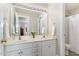 Bathroom with double sinks, vanity, and walk-in shower are perfect for getting ready at 8816 Valley Springs Pl, Raleigh, NC 27615