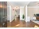 Inviting foyer with hardwood floors, neutral paint, and views of the living spaces at 8816 Valley Springs Pl, Raleigh, NC 27615