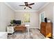 Comfortable office space with a ceiling fan, nice natural light, and modern décor at 8816 Valley Springs Pl, Raleigh, NC 27615
