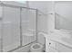 Well-lit bathroom with glass-enclosed shower and modern vanity with a bright and functional design at 8891 Commons Townes Dr, Raleigh, NC 27616