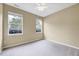 Bright bedroom with two windows overlooking the backyard at 921 Shefford Town Dr, Rolesville, NC 27571