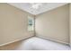 Carpeted bedroom featuring a window providing natural light at 921 Shefford Town Dr, Rolesville, NC 27571