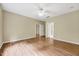 Bedroom with hardwood floors featuring arched entryways at 921 Shefford Town Dr, Rolesville, NC 27571