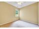 Cozy bedroom with carpet flooring and a window providing natural light at 921 Shefford Town Dr, Rolesville, NC 27571