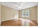 Bright bedroom with hardwood floors and natural light from two windows at 921 Shefford Town Dr, Rolesville, NC 27571