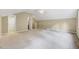 Large carpeted bonus room with multiple doorways and vaulted ceilings at 921 Shefford Town Dr, Rolesville, NC 27571