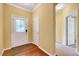 Inviting entryway featuring hardwood floors, decorative door and neutral-toned walls at 921 Shefford Town Dr, Rolesville, NC 27571