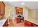 Kitchen with stainless steel appliances and arched openings to other rooms at 921 Shefford Town Dr, Rolesville, NC 27571