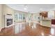 Bright and airy living space features a fireplace and natural light at 921 Shefford Town Dr, Rolesville, NC 27571