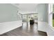Open living area with hardwood floors, seamless to the kitchen, with natural light at 97 Arapahoe Dr, Kenly, NC 27542