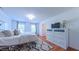 Cozy bedroom with wood floors, neutral walls, soft bedding and bright window light at 973 Rebecca Ln, Siler City, NC 27344