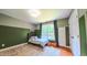 Cozy bedroom with a comfortable bed, large window, and natural light at 973 Rebecca Ln, Siler City, NC 27344