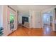 The entryway leads to an open-concept living room with hardwood floors and natural light at 973 Rebecca Ln, Siler City, NC 27344