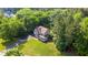 Beautiful craftsman home with a charming front porch and a lush green lawn at 973 Rebecca Ln, Siler City, NC 27344
