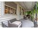 View of the outdoor patio with furniture and grill at 1001 N Orange Ave, Dunn, NC 28334