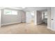 Bedroom featuring carpeting, a window, and an adjacent closet at 1001 N Orange Ave, Dunn, NC 28334