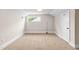 Bedroom featuring carpet, a window, and neutral paint at 1001 N Orange Ave, Dunn, NC 28334