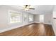 Bright open living room with windows and neutral paint at 1001 N Orange Ave, Dunn, NC 28334