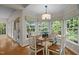 Charming breakfast nook with bay window, backyard views, and cozy dining space at 1004 Staffield Lane Ln, Chapel Hill, NC 27516