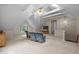 Open living room with a vaulted ceiling, hardwood floors, and stylish ceiling fan at 1004 Staffield Lane Ln, Chapel Hill, NC 27516