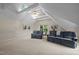 Spacious living room with vaulted ceilings, skylights, and comfortable seating arrangement at 1004 Staffield Lane Ln, Chapel Hill, NC 27516
