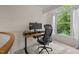 Comfortable office area with desk, ergonomic chair, and natural light at 1004 Staffield Lane Ln, Chapel Hill, NC 27516