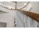 Bright staircase with curved wood banister and white spindles at 1004 Staffield Lane Ln, Chapel Hill, NC 27516