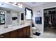Clean bathroom featuring a double sink vanity, mirror, toilet, and shower/tub combination at 101 Claystone Dr, Gibsonville, NC 27249