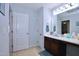 Spacious bathroom showcasing a sink, counter space, and a door leading to a toilet at 101 Claystone Dr, Gibsonville, NC 27249
