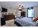 Comfortable bedroom with ceiling fan, TV and ample dresser storage at 101 Claystone Dr, Gibsonville, NC 27249