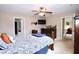 Bright bedroom with a ceiling fan, and doorway views to other rooms at 101 Claystone Dr, Gibsonville, NC 27249