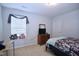 Cozy bedroom with natural light, neutral walls, and carpet flooring at 101 Claystone Dr, Gibsonville, NC 27249