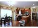 Modern kitchen with granite countertops, stainless steel appliances, and a cozy breakfast nook at 101 Claystone Dr, Gibsonville, NC 27249