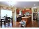 Eat-in kitchen with an island, stainless steel appliances, and abundant cabinet space at 101 Claystone Dr, Gibsonville, NC 27249