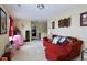 Cozy living room with comfortable seating, rug and view of the hallway at 101 Claystone Dr, Gibsonville, NC 27249