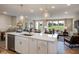 Modern kitchen featuring a large island, stainless steel appliances and an open floor plan at 1033 Masters Place Way # 110, Durham, NC 27703